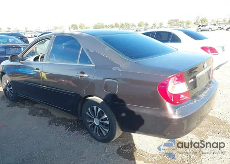 2003 Toyota Camry Le z USA, uszkodzony, nr VIN 4T1BE32KX3U662140